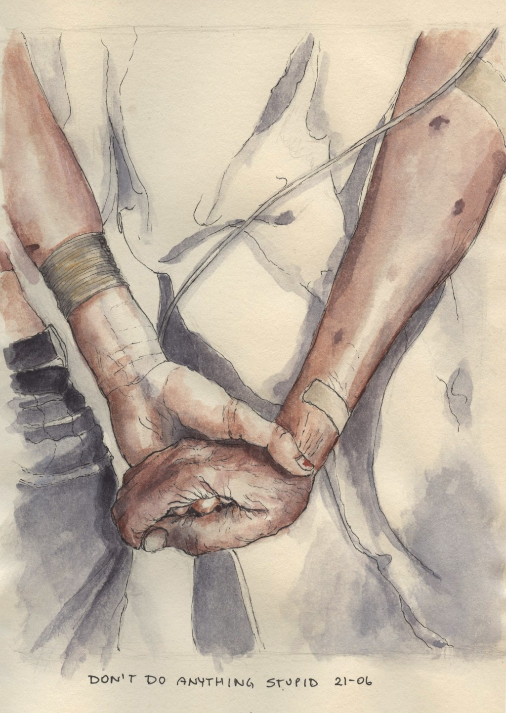 A teenage hand holding a senior's hand in a hospital.